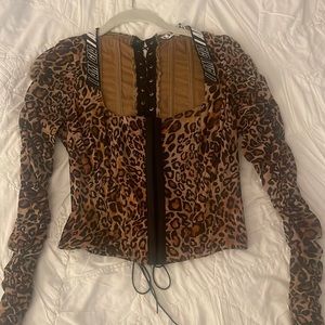 Tiger Mist Cheetah long sleeve lace back top